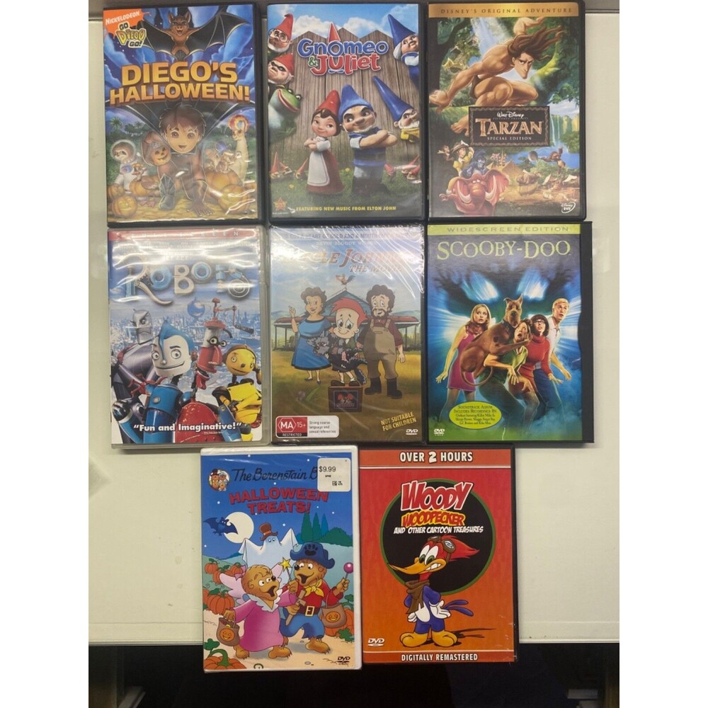 8 kids DVD cartoon lot Woody Woodpecker Gnomeo Tarzan Diego Scooby Doo Robots